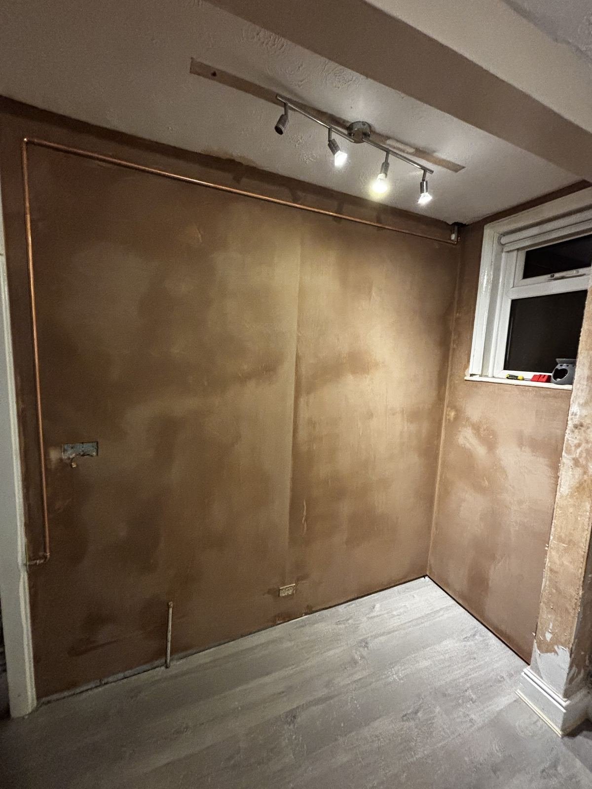 After: the same corner plastered smooth