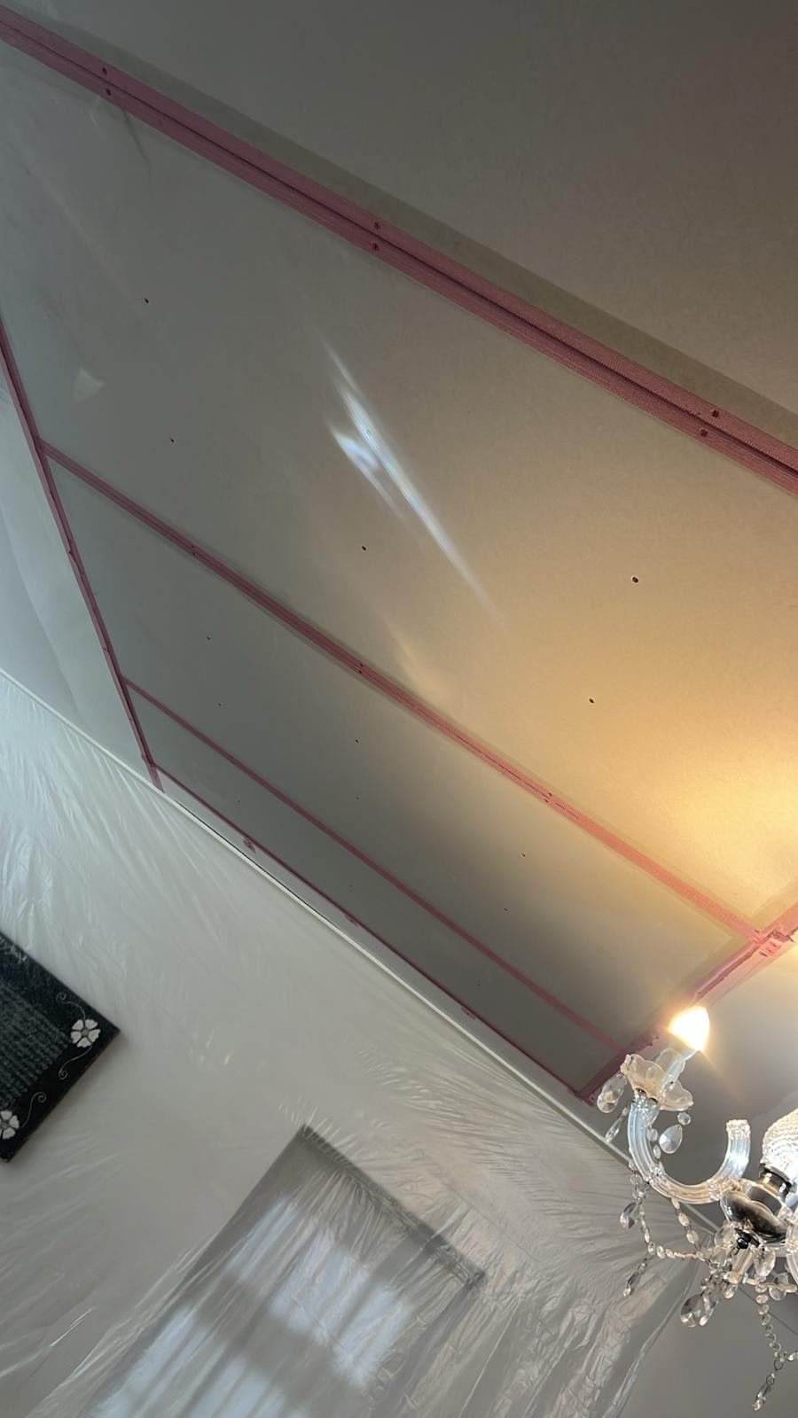 New ceiling, edges masked for the decorator